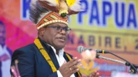 Gubernur Papua Tengah, Meki Fritz Nawipa dalam sambutan membuka Rakerprov KONI Papua Tengah Tahun 2025 di aula LPP RRI Nabire, Jumat (27/6/2025). - Dok. Humas